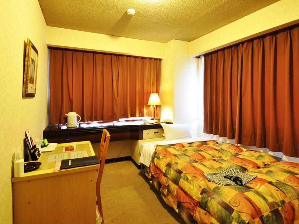 Business Hotel Atelier Кагосима Экстерьер фото