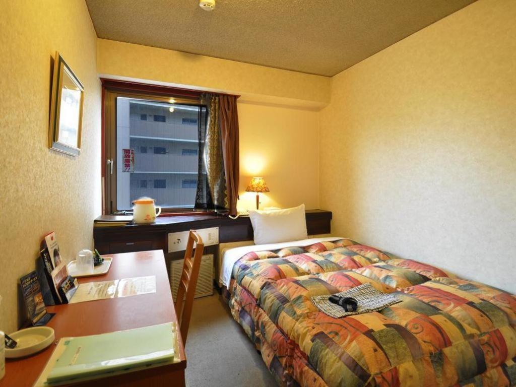 Business Hotel Atelier Кагосима Экстерьер фото